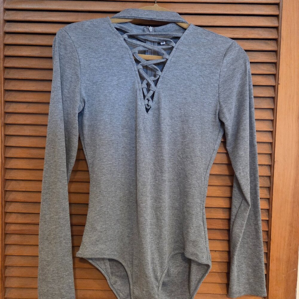 body suit with criss cross front detail